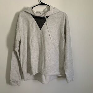 Mesh cutout hooded long sleeve pullover
